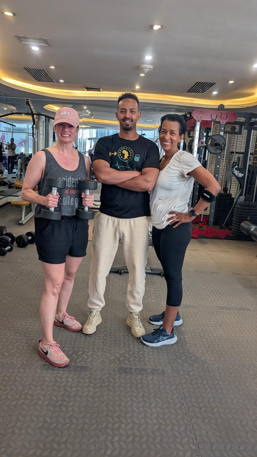 Coach Miki with two happy clients after a session